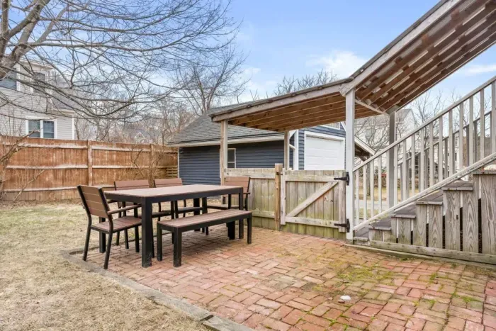 This beautiful and secure fenced-in backyard is spacious, dog-friendly, and perfect for outdoor activities and relaxation, providing a safe and fun environment for your adorable dogs.