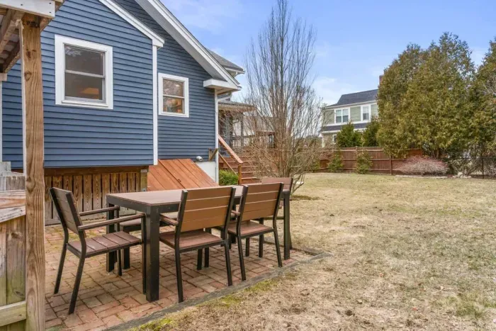 This beautiful and secure fenced-in backyard is spacious, dog-friendly, and perfect for outdoor activities and relaxation, providing a safe and fun environment for your adorable dogs.