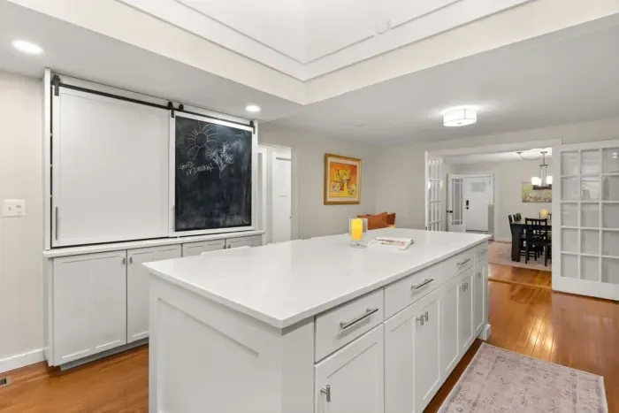 This fully equipped kitchen features stainless steel appliances, and plenty of counter space for meal preparation.