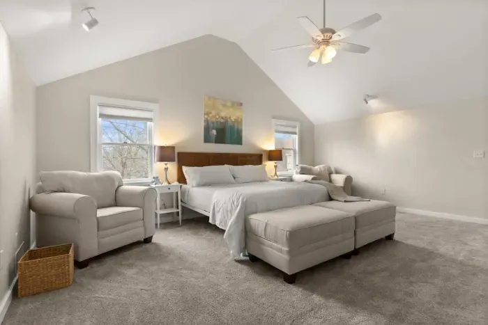 King-size bed, a flat-screen TV, an elegant electric fireplace, and a private ensuite bathroom. Enjoy a peaceful and rejuvenating sleep in this cozy haven.