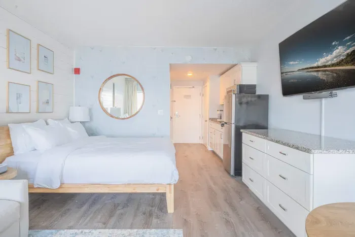 Studio layout with fully equipped kitchenette, Queen bed with clean linens provided, and smart TV