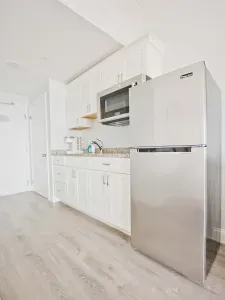 The kitchenette does not have a stovetop but it does have a microwave with a convection bake option!! Coffee is provided