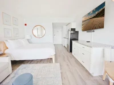 Studio layout with fully equipped kitchenette, Queen bed with clean linens provided, and smart TV