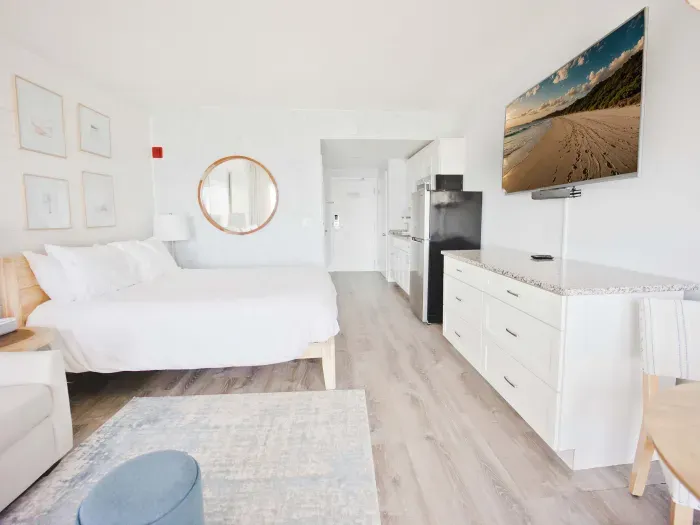Studio layout with fully equipped kitchenette, Queen bed with clean linens provided, and smart TV