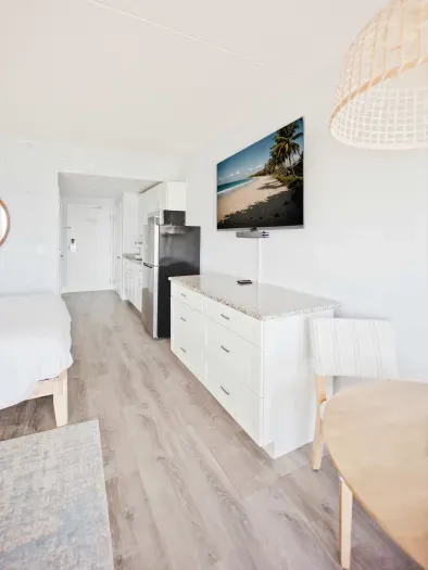 Smart TV, and fully equipped kitchenette. The kitchenette does not have a stovetop but it does have a microwave with a convection bake option!! Coffee is provided