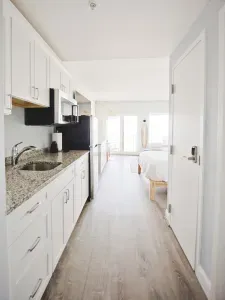 The kitchenette does not have a stovetop but it does have a microwave with a convection bake option!! Coffee is provided
