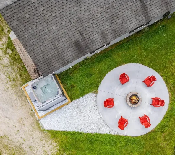 New patio with fire place, and hot tub