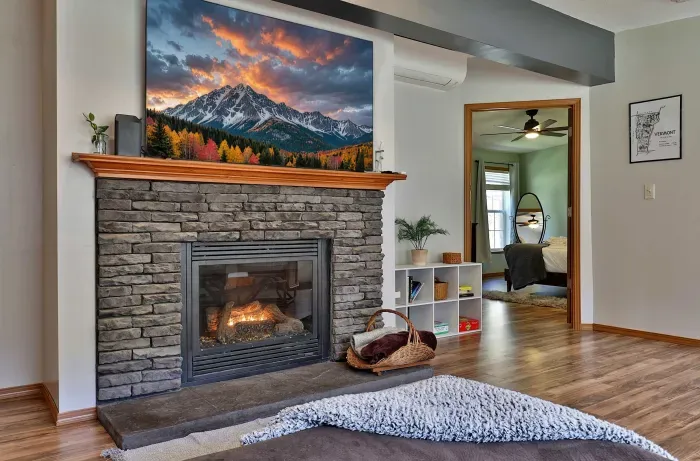 Warm up by the fireplace and watch a movie on our 65" Roku TV