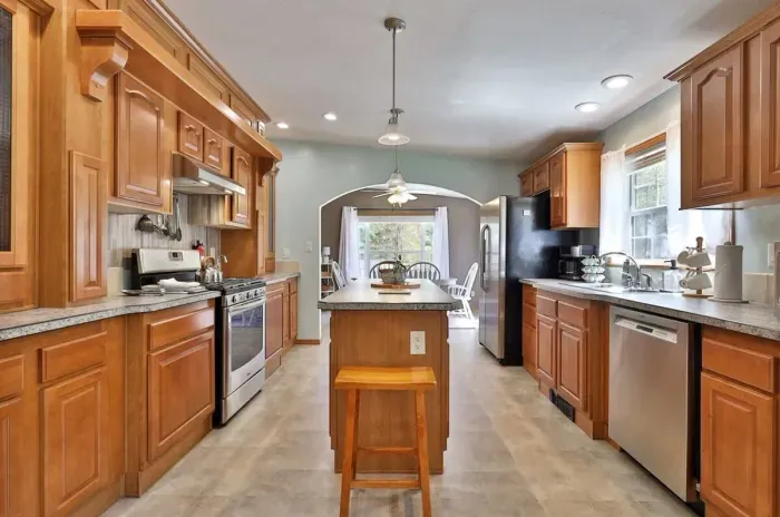 Open concept kitchen that runs right into the living room and dining area