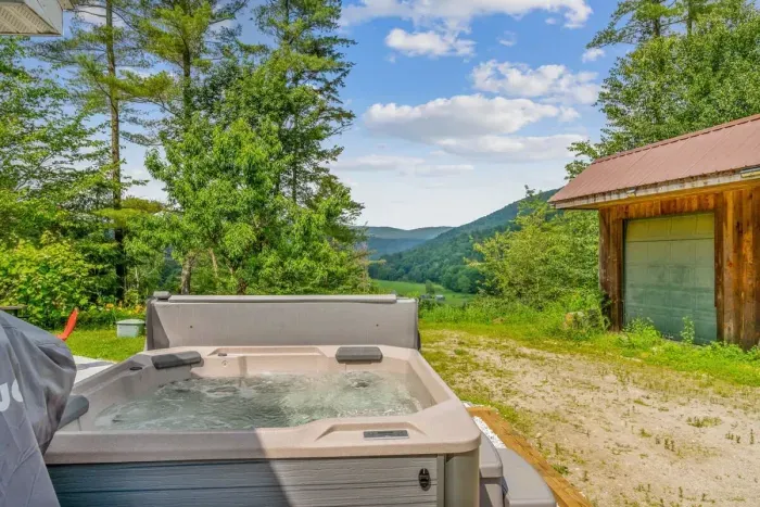 Enjoy the beautiful view while taking a dip in the hot tub!