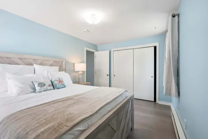 Bedroom #1 with a Queen bed and minisplit heating/cooling. Clean linens provided.