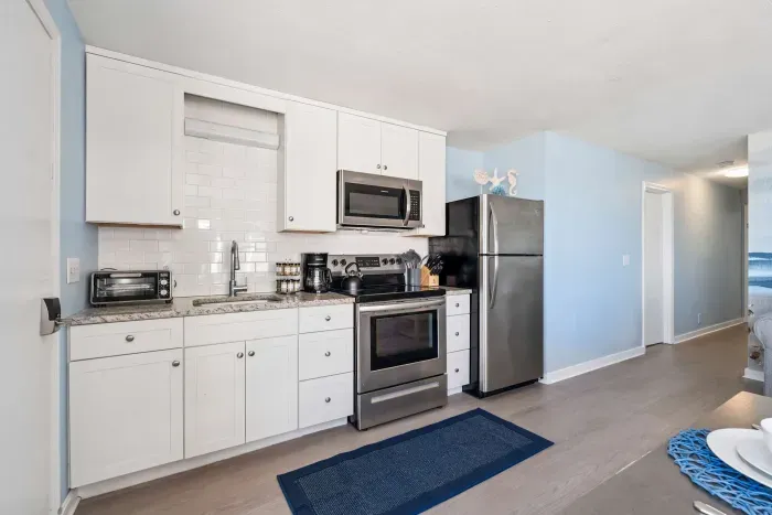 Fully equipped open kitchen, dining, and living room!