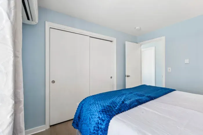 Bedroom #2 with a Queen bed and minisplit heating/cooling. Clean linens provided.