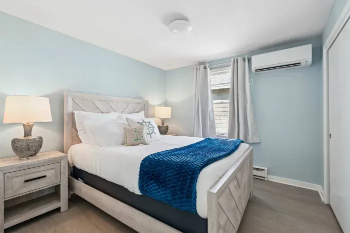 Bedroom #2 with a Queen bed and minisplit heating/cooling. Clean linens provided.