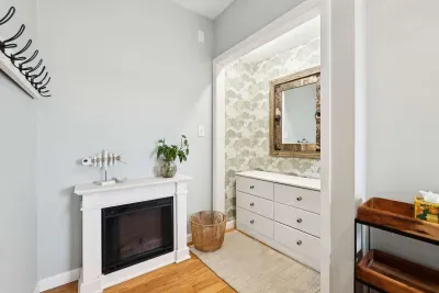 Small electric fireplace for extra heat in second bedroom