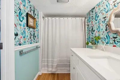 Full bathroom with tub shower combo. Clean towels provided!
