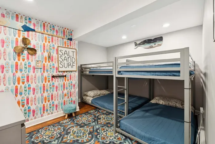 Third bedroom with 1 twin-over-twin bunk bed, 1 full-over-full bunk bed. Note: This room sleeps 4 individuals. Clean linens are provided.