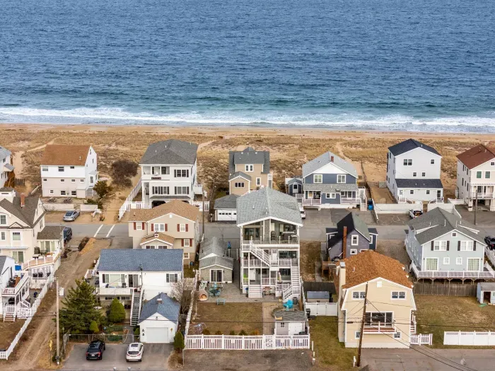 An aerial view of the home and Salisbury Beach! This property is literally across the street from the sand!