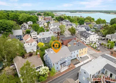 Aerial view of home, steps to Merrimack River, parks, trails and downtown Newburyport's top attractions.