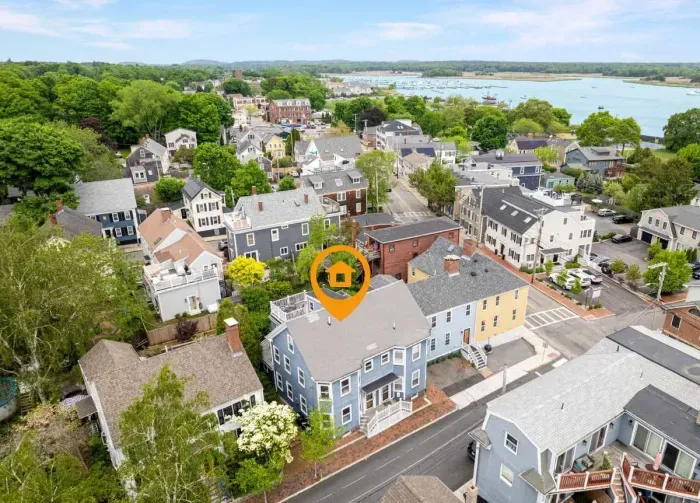 Aerial view of home, steps to Merrimack River, parks, trails and downtown Newburyport's top attractions.