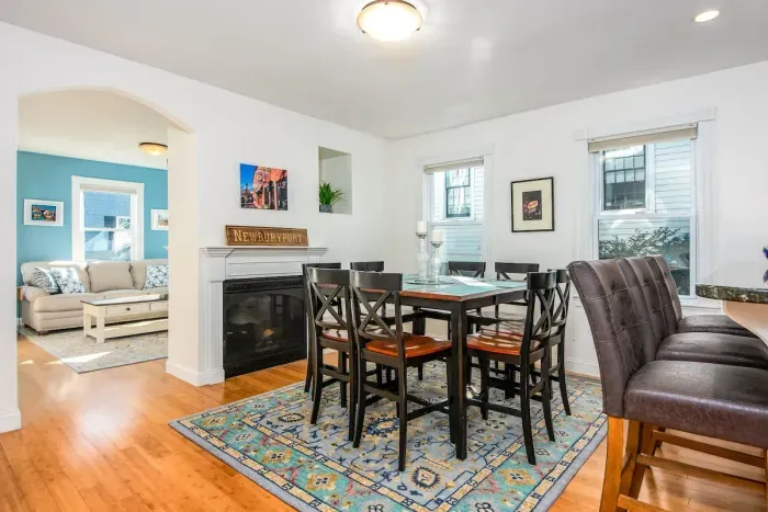The open concept dining room and kitchen offers an abundance of space for several cooks in the kitchen and friends and family to dine.