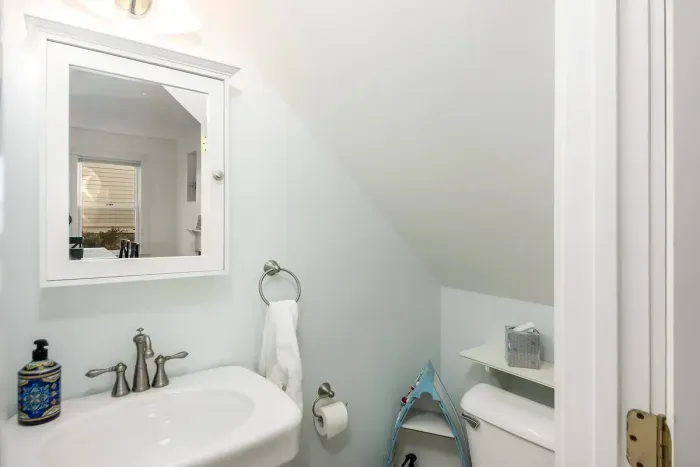 First floor half bathroom, in addition to the second and third floor full bathrooms.