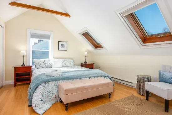 Third floor master bedroom with en-suite bathroom and private access to the roof deck.