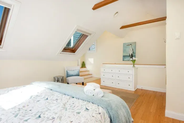 Third floor master bedroom with en-suite bathroom and private access to the roof deck.