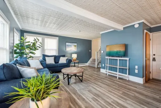 Living room with comfy sectional couch and smart TV!