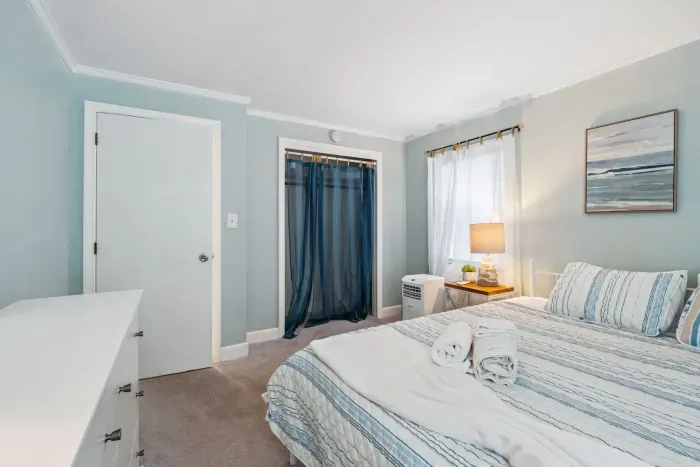 Primary bedroom with a king bed and provided clean linens