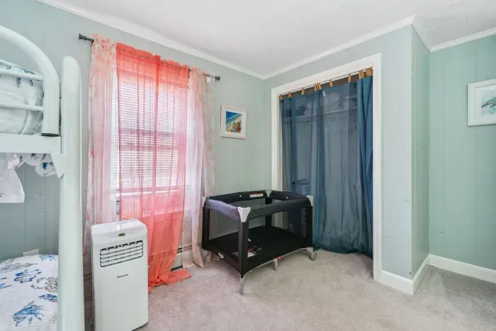 Second bedroom with full over twin bunk and a pack n play!