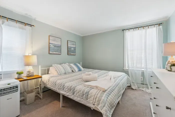 Primary bedroom with a king bed and provided clean linens