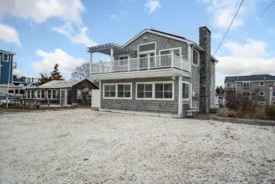 Welcome to Basin Street! A 3 bedroom home with incredible views of the Plum Island Basin! Parking for 4 vehicles in the white seashell driveway