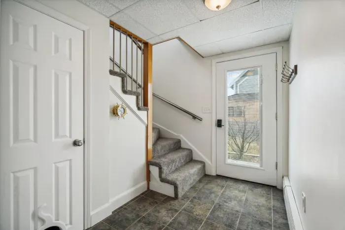 Main foyer with access to the side yard and driveway