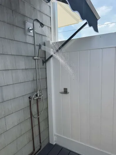 The outdoor shower! This is located off the driveway and the back deck