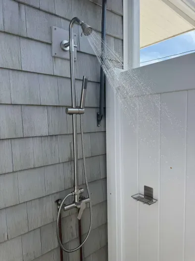 The outdoor shower! This is located off the driveway and the back deck