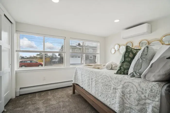 Bedroom #2! This bedroom has a queen bed, mini-split heating and cooling and is located on the first floor. 