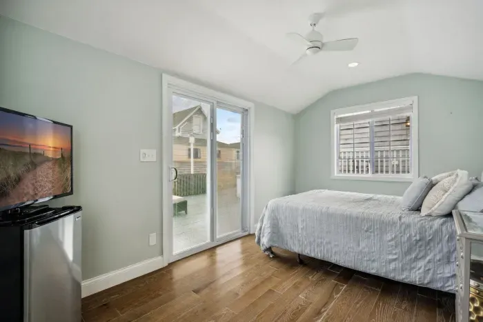 The DETACHED queen bunk house!! With a Roku smart tv and queen bed. This room is intended for SUMMER USE ONLY. It is lockable from the inside. It is ideal for adults, not children as it is not attached to the house. Clean linens provided