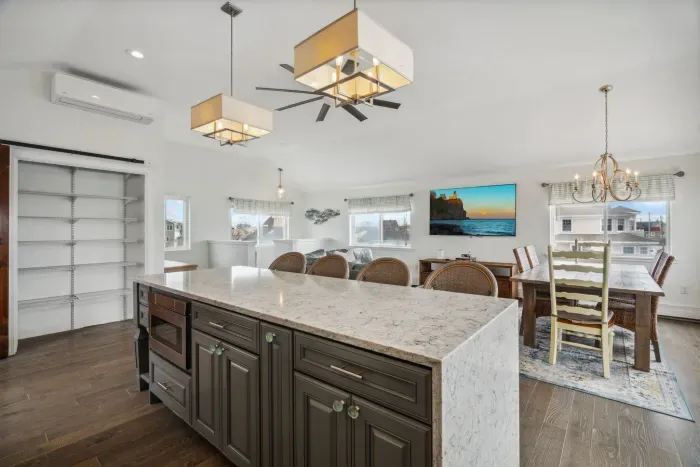 Fully equipped kitchen with all major appliances. Dining for 6 at the table and 4 at the island. 