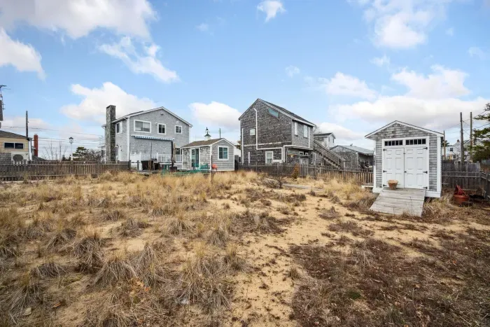 The backyard facing the home and the bunk house!