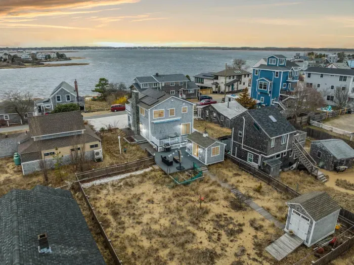 Welcome to Plum Time! A 3 bedroom home with incredible views of the Plum Island Basin! Parking for 4 vehicles in the white seashell driveway