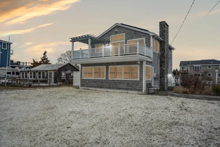Welcome to Plum Time! A 3 bedroom home with incredible views of the Plum Island Basin! Parking for 4 vehicles in the white seashell driveway