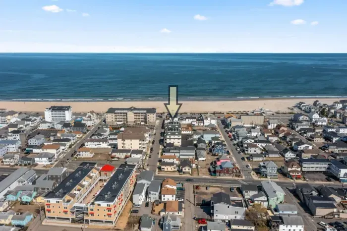 Aerial view of our condo, just steps to the beach, boardwalk and top attractions.