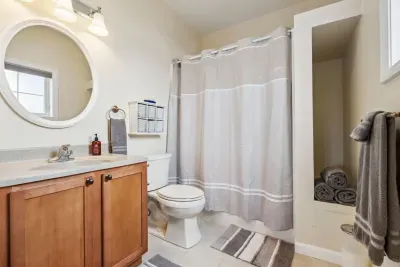 Master ensuite bathroom with jetted shower tub