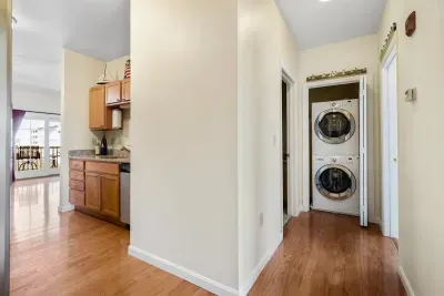 stackable washer and dryer in unit.