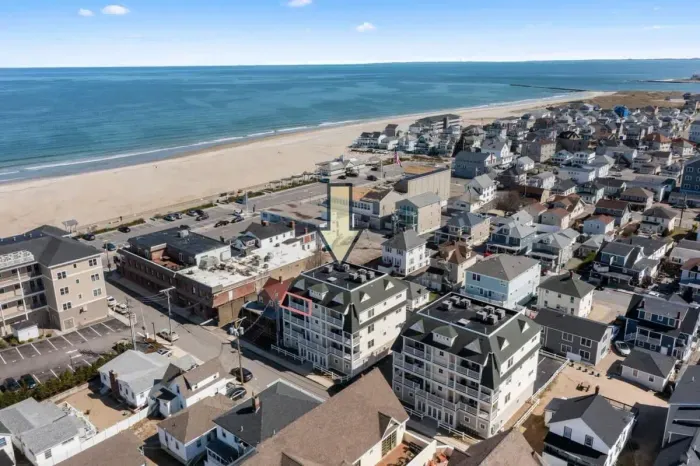 Aerial view of our condo, just steps to the beach, boardwalk and top attractions.