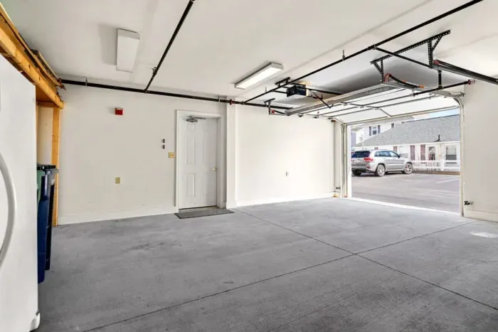 2 complimentary off-street parking spots available, including 1 garage spot (our garage stall is located immediately to the left of the common entrance door), and 1 outdoor spot.