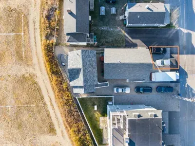 There are 2 parking spots for this home. The driveway space is outlined in this picture. They are located on the right side of the driveway