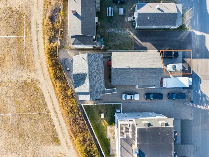 There are 2 parking spots for this home. The driveway space is outlined in this picture. They are located on the right side of the driveway