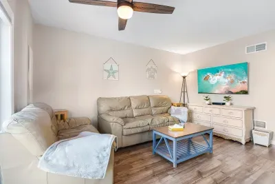 Living room with Queen sleeper and smart tv